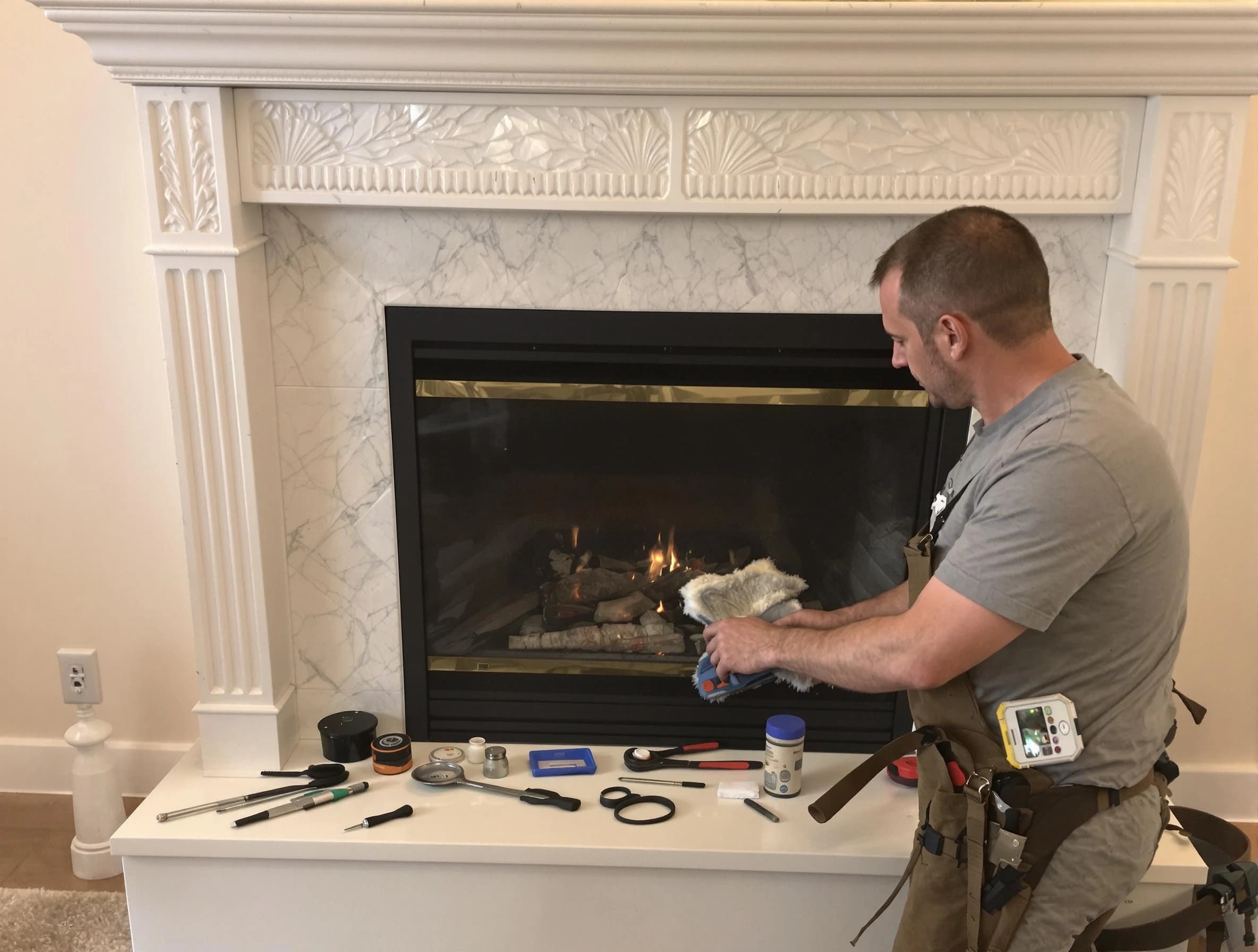 Howell Chimney Sweep performing fireplace maintenance in Howell, NJ